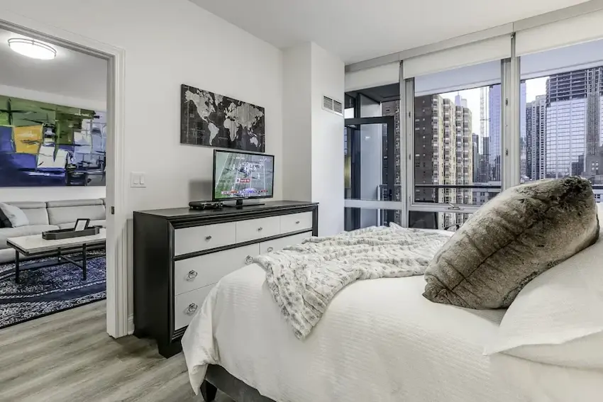 Group of professionals enjoying a luxury furnished corporate apartment in Downtown Chicago.